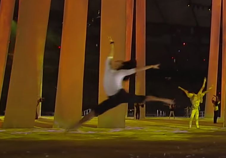 Novy Bereber leaping across the floor of the stadium during the Vancouver 2010 Opening Ceremony