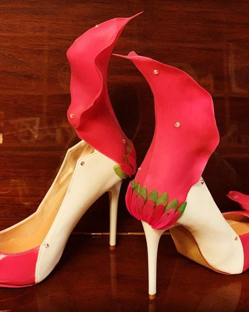 A pair of hand-decorated #StilettoNB heels